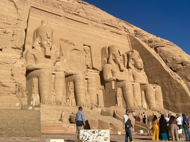 The rock-cut temples of Abu Simbel with large statues.