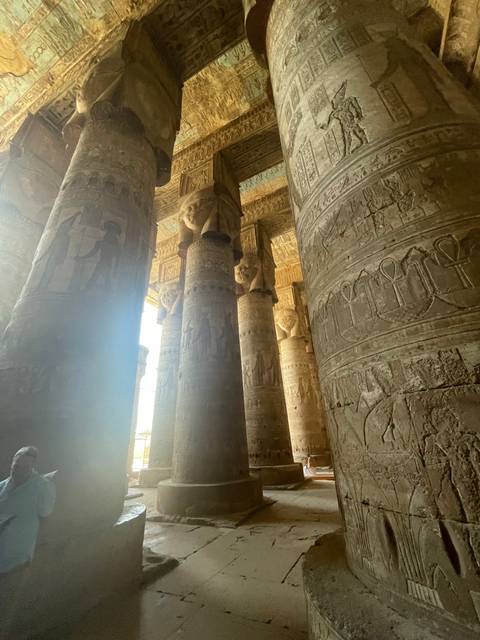 Columns with hieroglyphics in an ancient temple.
