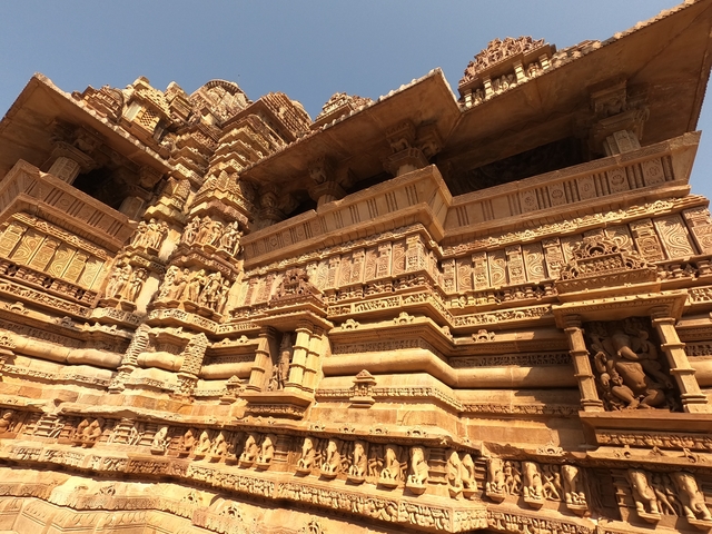       Close-up of ornate temple carvings.
  