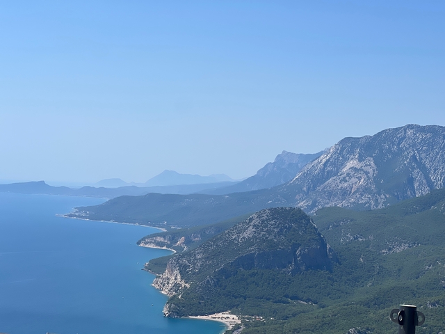       Scenic coastal view of mountains and ocean.
  
