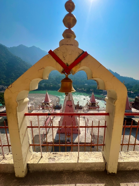 Temple view with a bell overlooking a river