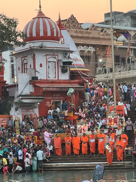 Busy street scene with people gathered for an event
