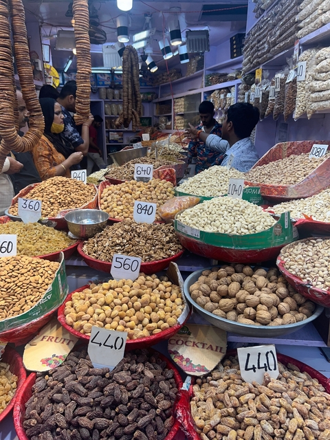 Market scene with an array of nuts and fruits on display