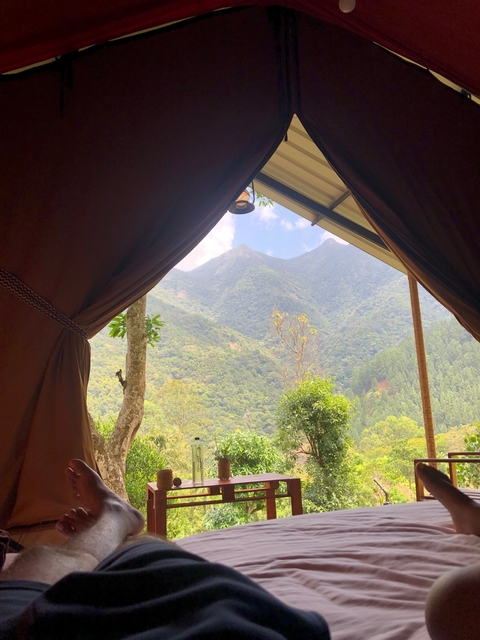 Mountain view from inside a tent.
