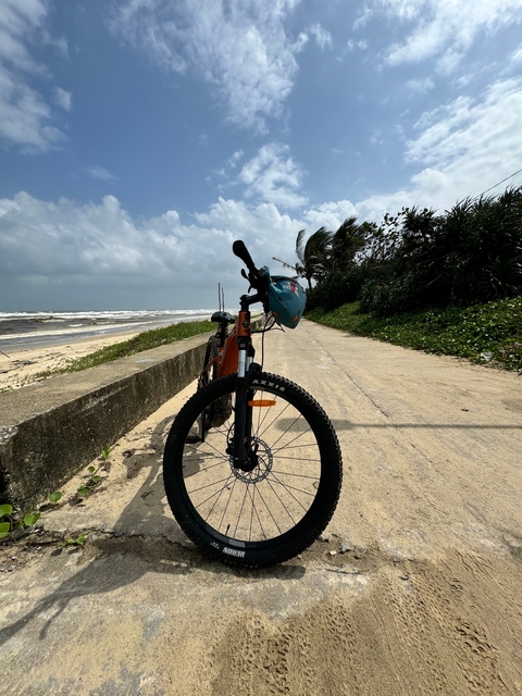 Bicycle parked on a coastal pathway