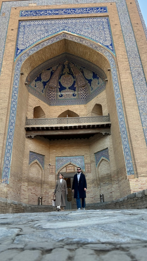 Brick and tile architecture with intricate carvings.