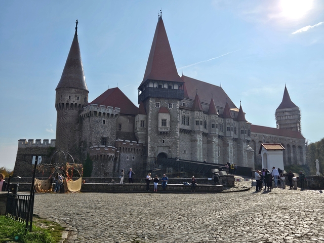 Large medieval castle with multiple towers.