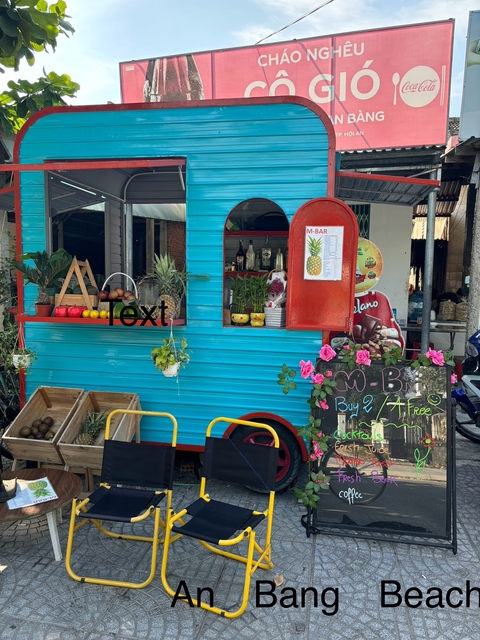       Colorful food truck with vibrant decorations and signs.
  