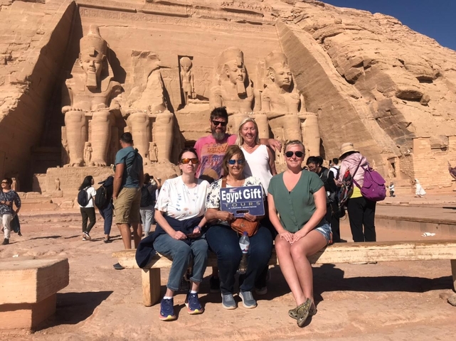       Group photo in front of the Abu Simbel temples.
  