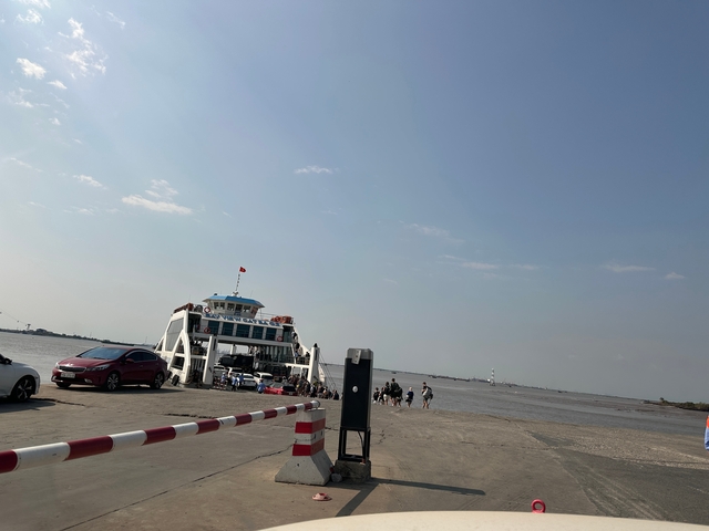 Ferry on the river with passengers.