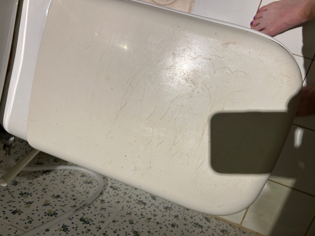       Scratched surface of an indeterminate object.
  