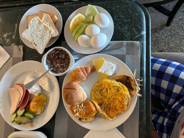 A Continental breakfast spread on a table.
