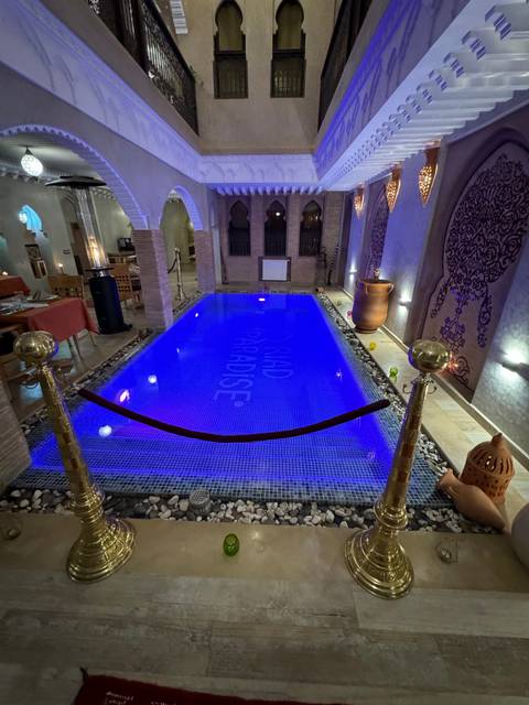      Indoor pool area with luxurious decor.
  