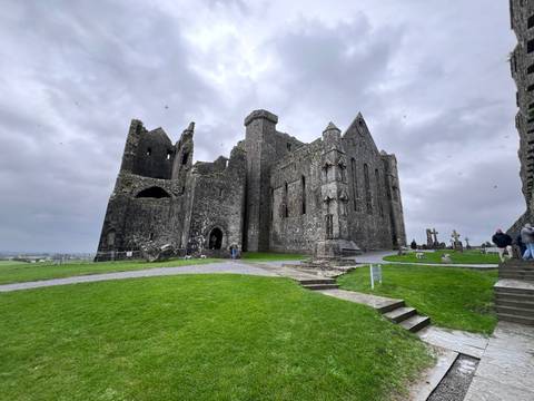 Visitors exploring the historic Rock of Cashel.