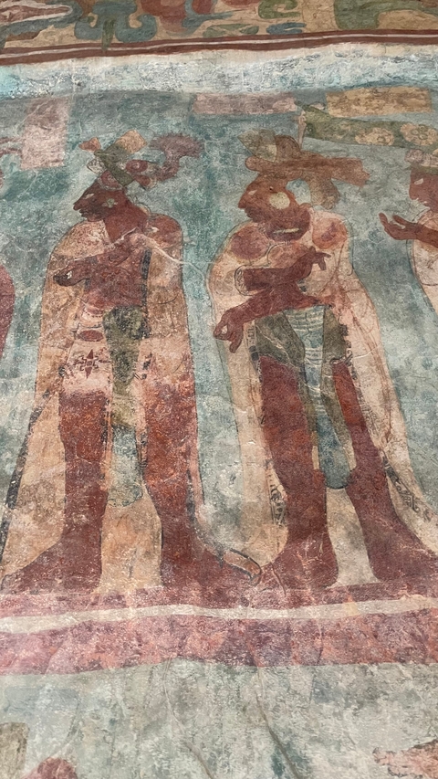       Detailed view of an ancient mural on a wall.
  