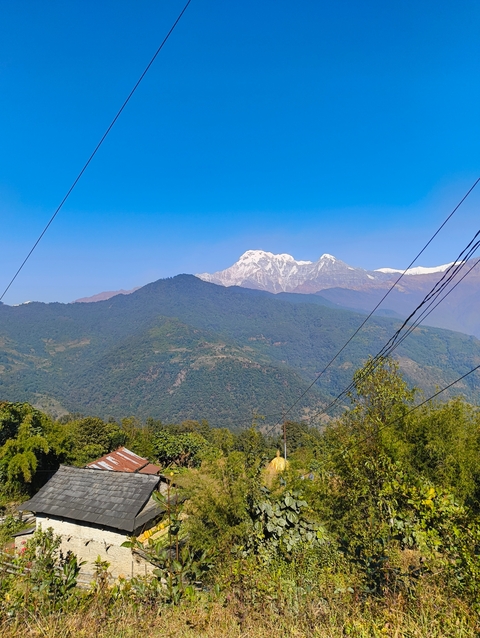 Mountainous landscape with snow-capped peaks.