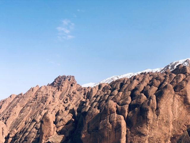 Rock formation with clear blue sky.