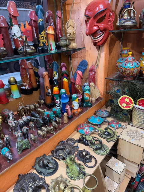 Traditional handicraft souvenirs displayed in a shop.