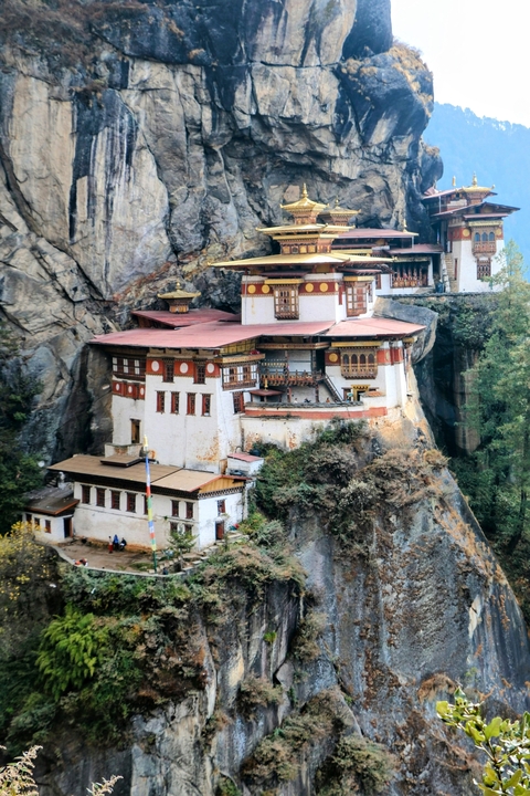      Taktsang Monastery perched on a rocky cliff.
  
