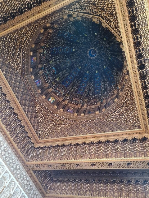 Intricate ceiling design with stained glass.