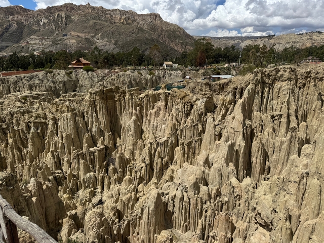 Dramatic canyon landscape with eroded cliffs resembling a labyrinth.
