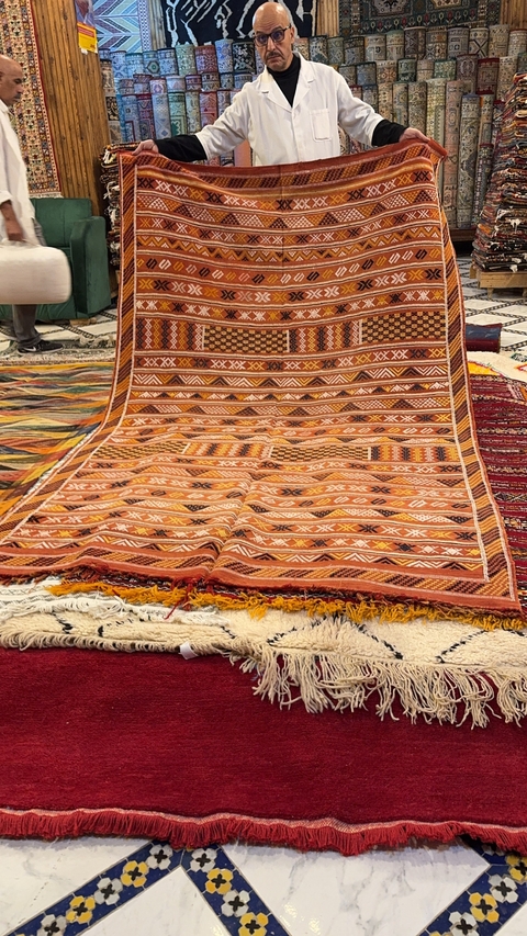 Colorful Moroccan rug on display.