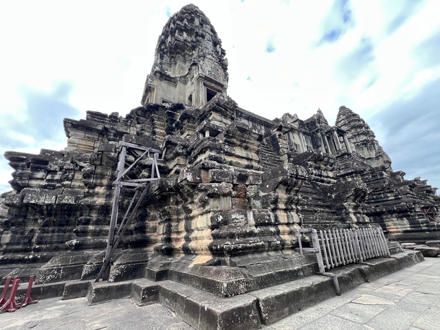       Ancient stone temple structure with intricate carvings.
  