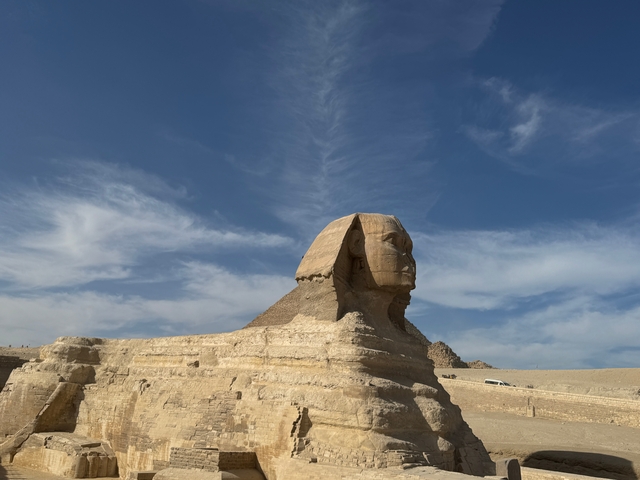 The Great Sphinx of Giza under a clear blue sky.