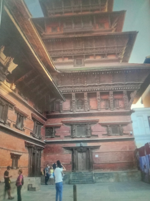 Historic building with intricate wooden architecture.