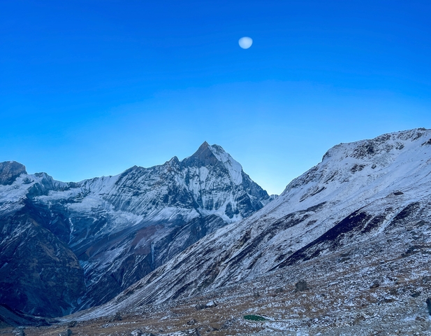       Snow-covered mountainous terrain.
  