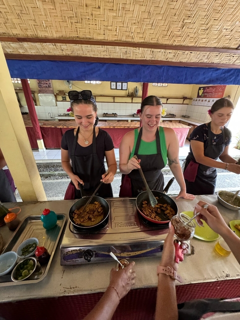 People participating in a cooking class.