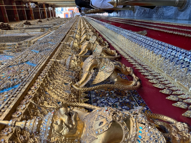Ornate temple wall with gold details.