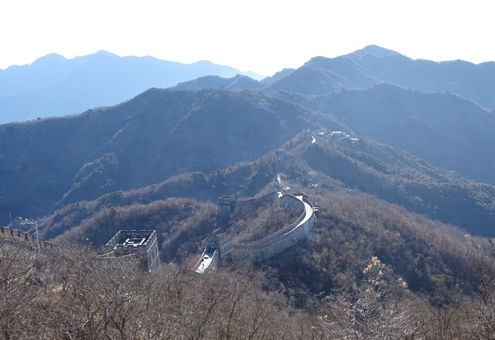 Aerial view of the Great Wall of China on a mountain range.