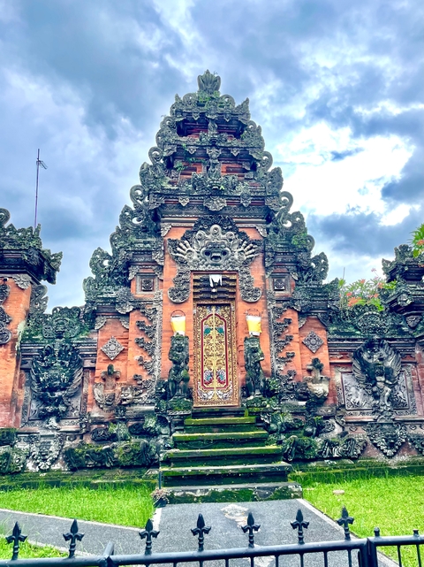 Traditional Balinese temple facade with intricate designs.