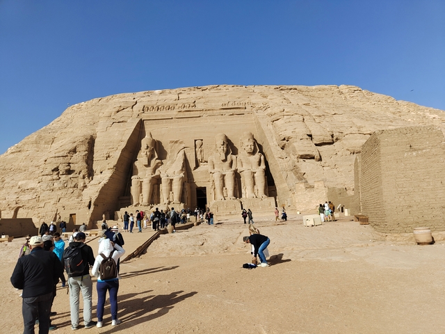       Crowd visiting the impressive rock-cut temple of Abu Simbel.
  