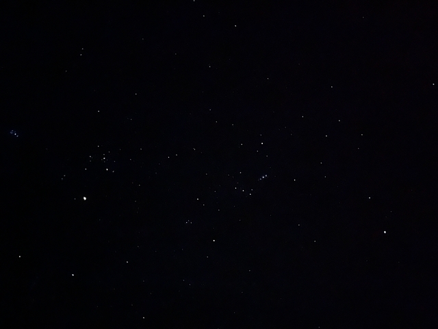       Clear night sky with scattered stars.
  