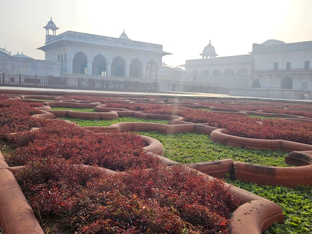 Intricately designed Mughal garden with historic architecture.