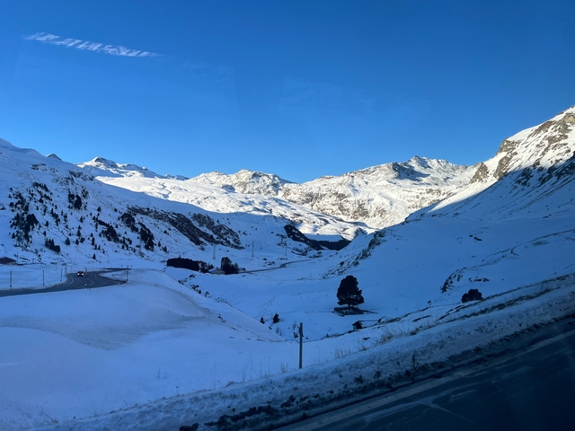 Panoramic view of a snowy mountain range.