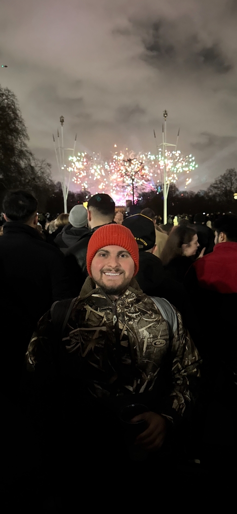Person in a crowded outdoor night event.