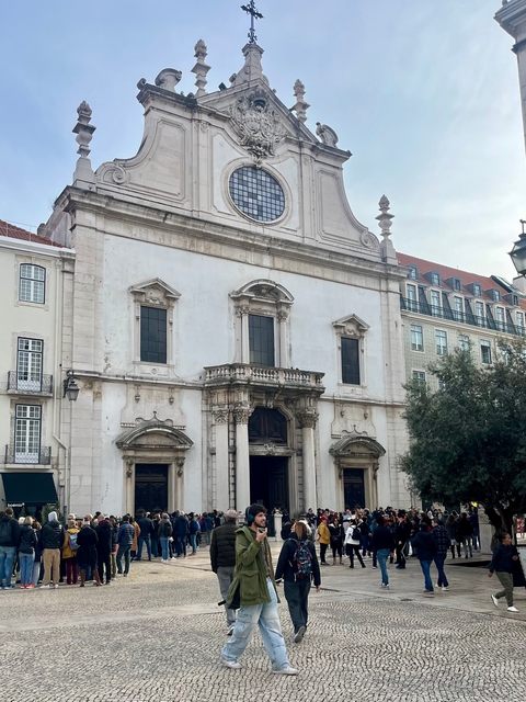       Facade of a historical church building.
  