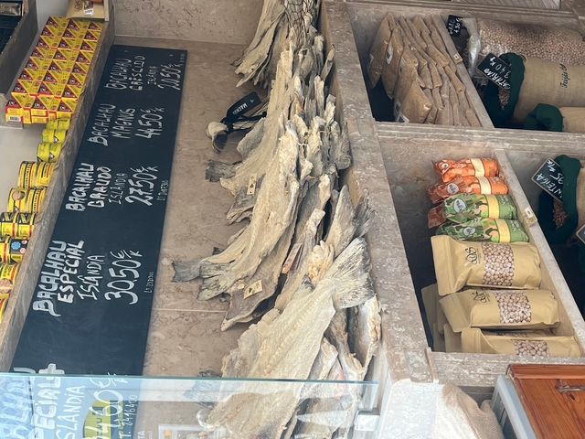       Dried fish displayed for sale.
  