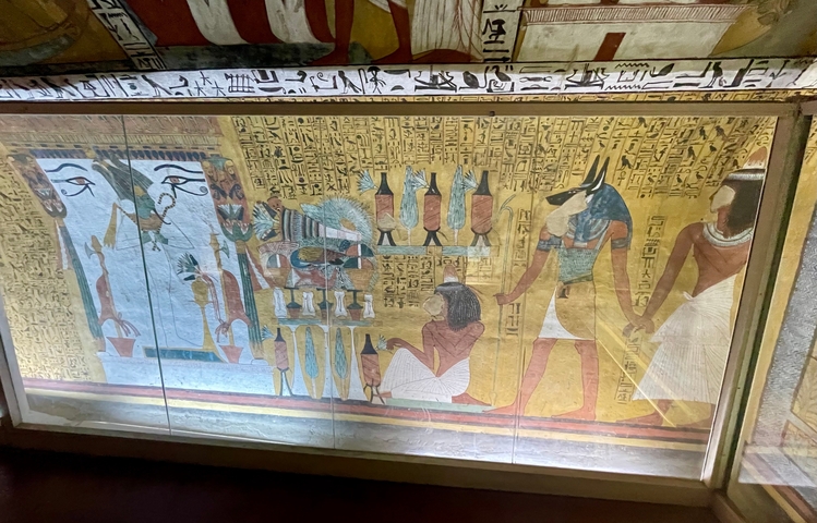 Colorful and elaborate ancient Egyptian wall art.
