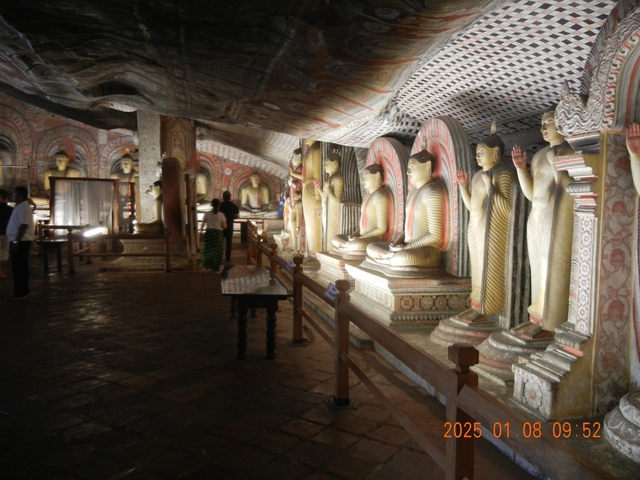 Interior of a temple with Buddha statues.