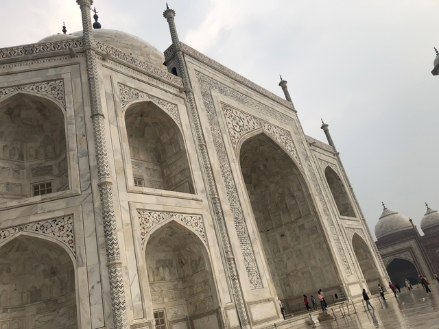 Close-up of the Taj Mahal's intricate marble facade.