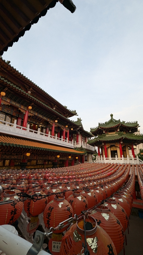       Ornate buildings of a traditional Chinese temple.
  