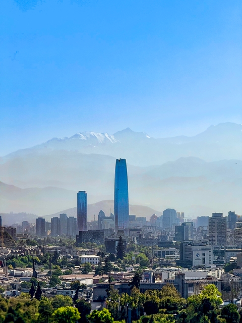 Cityscape with mountains in the background.