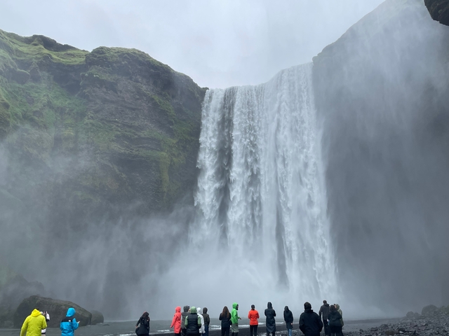       Massive waterfall cascading over cliffs.
  