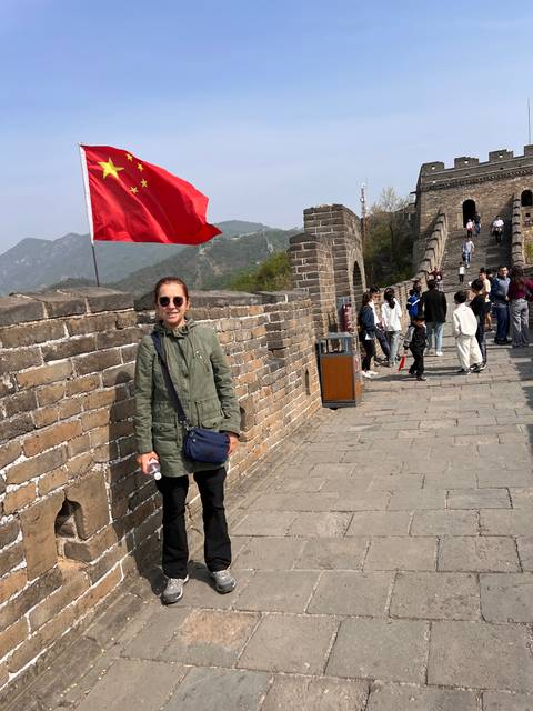 A person standing on the Great Wall of China.