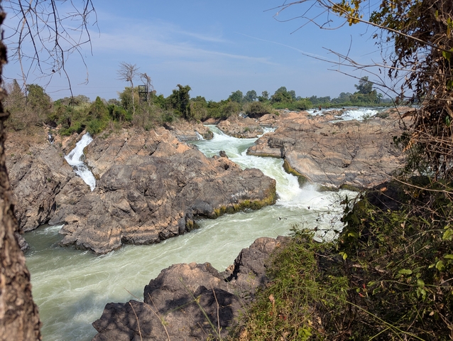       River flowing through rocky terrain.
  