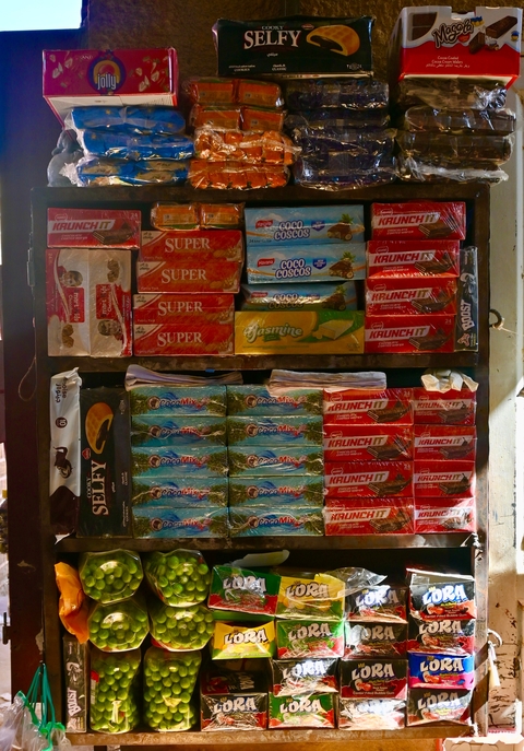       Stack of packaged snacks on display
  